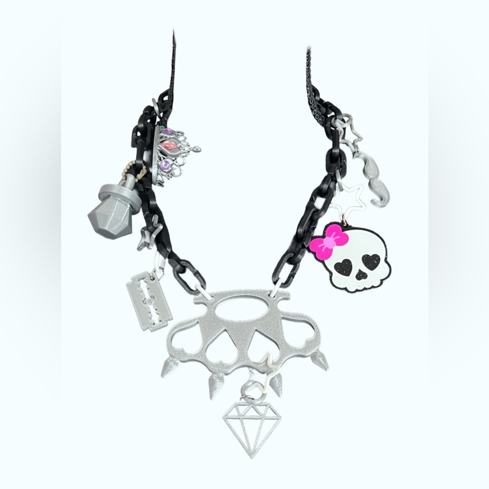 Silver Metallic Scene Queen Heart Brass Knuckles and Charms Statement Necklace